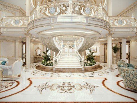 This picture shows the ruins of a castle in Scotland with a long grassy hill leading up to it. The castle has walls and towers built of stone, and there is a small lake nearby. The landscape is surrounded by rolling hills and trees with patches of fog in the distance.