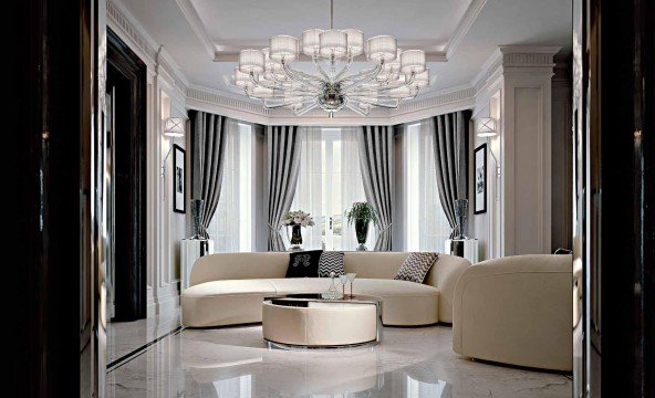 This picture shows two green apples on a white background. The apples are both facing the same direction and are sitting side by side. Both of the apples have a slightly curved shape and have a bright glossy finish. The texture of the skin on the apples is visible, as well as some subtle color variations.