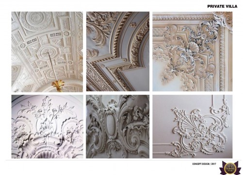 The picture shows a woman wearing a red dress and a white sweater, standing in front of a brick wall with graffiti on it. She is facing the camera with her hands clasped in front of her body.