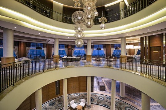 This picture shows a globe of the earth surrounded by a halo of colors. The colors from yellow to red appear to correlate with increasing global temperatures.