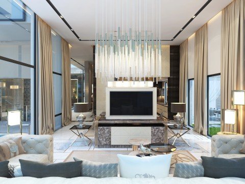 In this picture, there is an old-fashioned black telephone with a rotary dial. The rotary dial is positioned at the top of the telephone, and the handle of the phone is grey. The receiver is affixed to the base of the phone with a curly cord which is plugged into the wall.