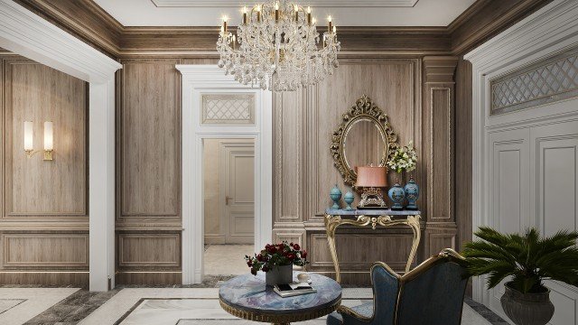 The picture shows a majestic rocky mountain landscape. The sky is painted in beautiful hues of pink and orange as the sun sets behind the mountain range. Dark green trees are silhouetted against the rocks below, and patches of snow still linger on the ground in some areas. In the foreground, a small lake stretches out to form a mirror image of the stunning scenery.