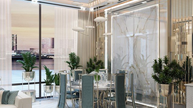 This picture shows a close-up of a woman wearing a black and white striped sweater and a pair of eyeglasses. Her hair is in a high ponytail, and her lips are lightly tinted with pink lipstick. The background is blurred out, highlighting the woman in the foreground.