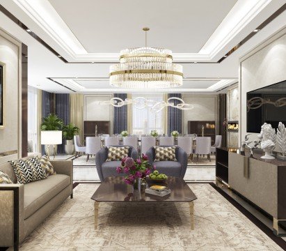 This picture shows a woman in a kitchen wearing a white chef's hat and coat while making a pizza. The woman is holding a wooden rolling pin in her hand and looking down at the dough that she is preparing. The counters, cabinets, and oven in the background suggest that the woman is making the pizza in the kitchen of a restaurant or home.