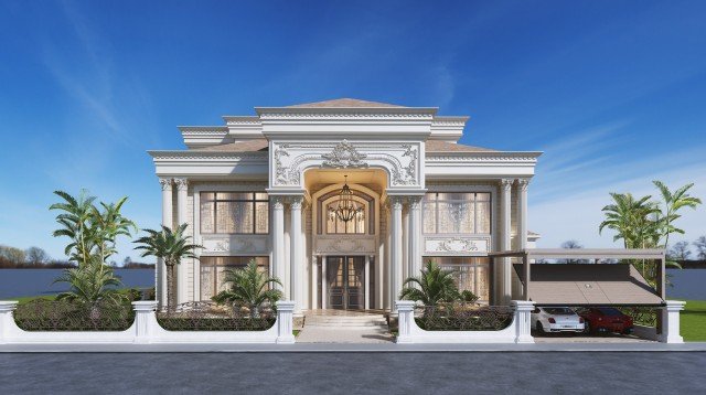 Interior of a modern kitchen, featuring white cabinets and dark countertops.