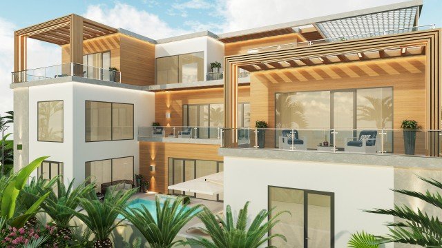 The picture depicts a luxurious living room, featuring off-white walls, plush chairs and sofas, a faux-marble fireplace, and a tall set of floor-to-ceiling windows with golden curtains. The room is decorated with light fixtures, end tables, and wall art.