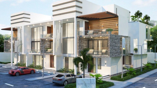 This image shows an interior design from Antonovich Design. It features a modern living room with an off-white and gold color palette. The walls are decorated with wall sconces and a large central mirror, while the furniture is upholstered in white and gold fabric. The floor features an intricate patterned cream-colored area rug that contrasts nicely with the white sofa. The accent pillows and elegant window treatments add a soft touch to the space.