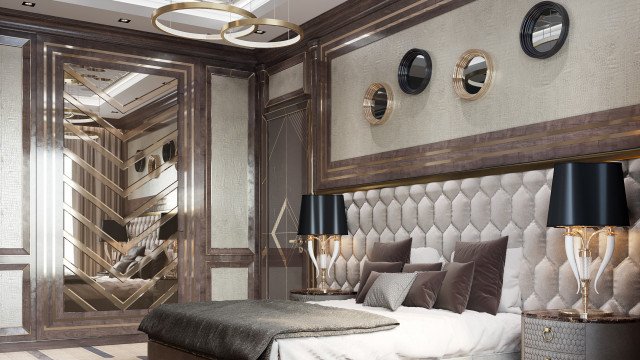 This picture shows an elegant modern bedroom design by Antonovich Design. The room features a white and beige color scheme accented with gold trim. The bed has a tall gold headboard and footboard with luxurious white and gold pillows and a coordinating gold nightstand. A large white dresser with gold accents is also visible in the background, as well as a plush rug on the floor.