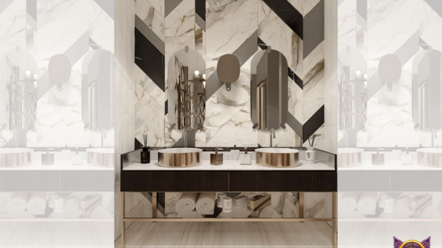 A modern interior design featuring a comfortable lounge chair, a sleek monochromatic entertainment center, and a luxurious area rug.