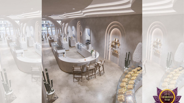 A grand staircase with intricate details and highly polished marble steps, balustrade, and columns.