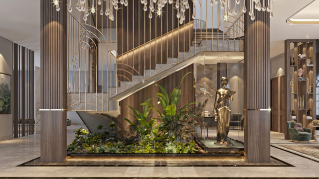 This picture shows an ornate and luxurious living room in a large traditional Russian home. The room is decorated with plush carpets, large wall art featuring classic and antique designs, large gold-framed mirrors, and a grand chandelier. There are two large sofas upholstered in velvet and trimmed with gilded trim details, along with several accent chairs and a vintage piano. Overall, this room exudes elegance and old-world charm.