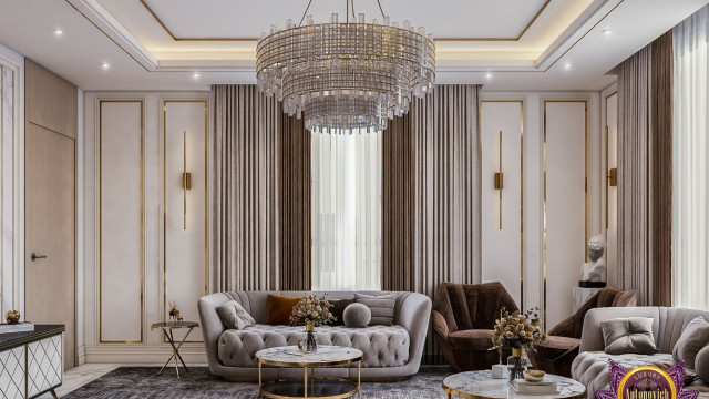 This picture shows a modern and luxurious living room with white walls and black and cream furniture. The living room features a white sectional couch, two black wingback chairs, a white marble coffee table, a black console table, and a shaggy cream rug. Several potted plants add a touch of nature to the space, while crystal lighting fixtures provide a glamorous look.