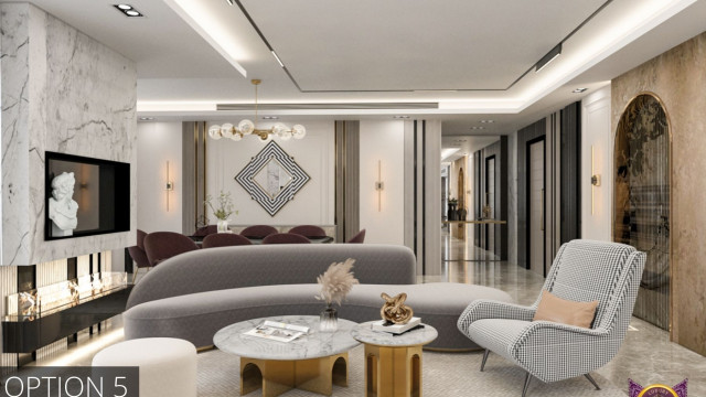 This picture shows a luxurious living room with contemporary design elements. The room has a white and gray palette, with plush velvet furniture in various shades of gray. The walls are clad with a soft-white textured wallpaper, contrasted with black frames and industrial metal sconces. In the middle of the room is a modern grey grand piano, while the walls are adorned with interesting art pieces. The room is completed with a crystal chandelier and green house plants for a cozy and inviting atmosphere.