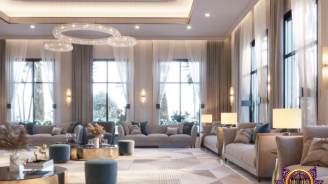 The picture shows a luxurious modern bedroom featuring white walls and furniture, with a bed frame and headboard upholstered in rich pink velvet. The bed is surrounded by several ornate gold lamps and accessories, adding to the glamorous aesthetic of the space. Meanwhile, a dark gray rug and small black nightstand keep the room from feeling too busy or cluttered.