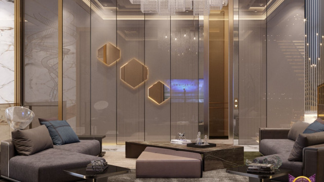 A marble-tiled bathroom with a white freestanding bathtub, his-and-hers basins and a rainfall shower.