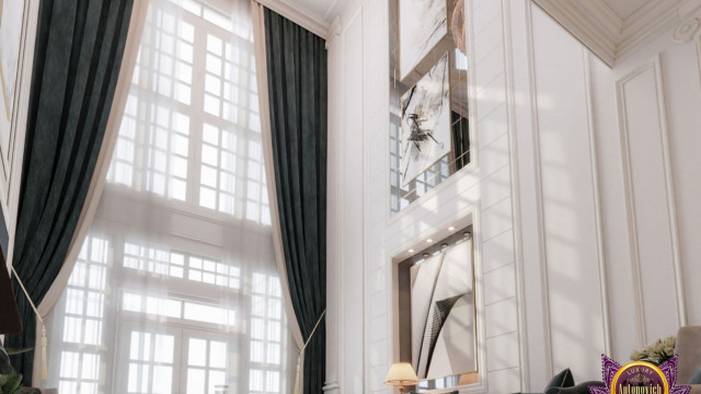 A large, elegant entranceway featuring intricate marble detailing, ornate carvings, and decorative accents.