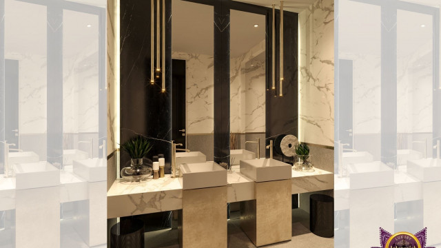 Modern kitchen with marble countertop, white cabinets, backsplash, and stainless steel appliances.