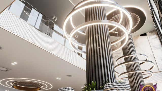 A luxurious living room featuring a white and gold sofa, two armchairs, a grand piano, and a crystal chandelier.