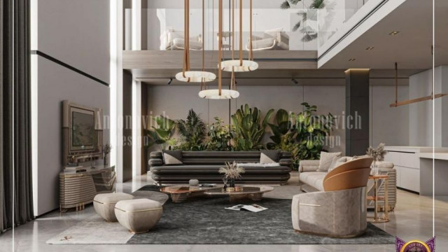 Luxurious sitting area with ornate gold-plated couch and matching armchair, surrounded by a classic beige wallpaper with gold patterns.