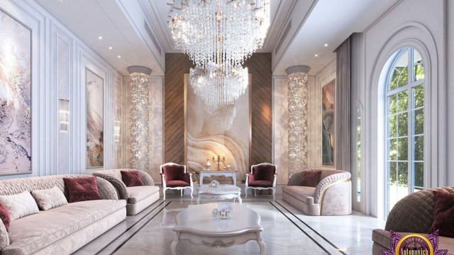 This picture is a luxury kitchen design by Antonovich Design. The kitchen features sleek, modern cabinetry with glossy black and white finishes. The countertops are made of marble and the walls are decorated with ornate wallpaper. In the center of the room is a large white island with a built-in stove and stainless steel sink. There is also a built-in coffee maker and bar area. A sophisticated and modern lighting system is used to create a warm and inviting atmosphere.