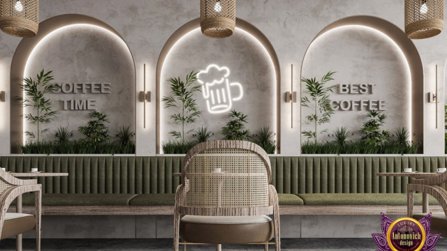 A grand staircase featuring intricate wood carved balustrades and light-colored marble flooring.
