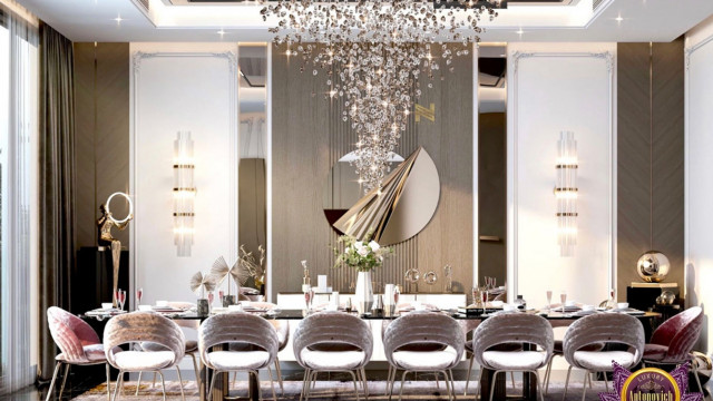 Modern living room design featuring an ivory-colored sofa, golden-accented chairs, and an ornate rug.