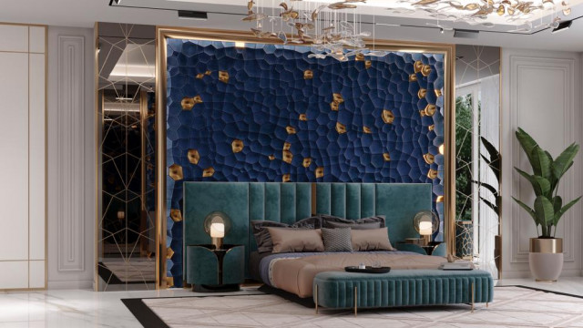 Grand staircase featuring ornate balustrades and handrails, with a central chandelier overhead.