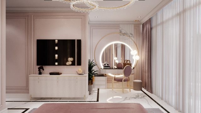 This picture is of a modern and luxurious living room, designed by Antonovich Design. The room features a white leather sectional sofa that is set on a white and gray rug in front of a marble fireplace. There is a glass-top table in the center of the room with two white leather chairs, and there are two round side tables with white lamps on either side. The walls are painted a light mint green and decorated with dark-framed art pieces.