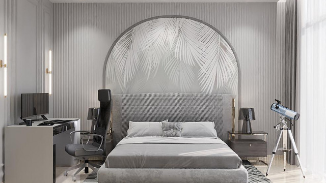 A luxurious interior with intricate molding and a decorative chandelier.