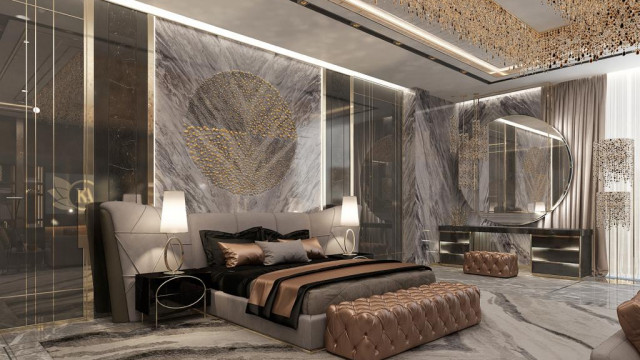 A pool area with a lounge seating area, tiled perimeter and an ornate pendant light.