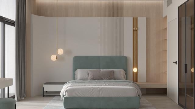 A contemporary living room featuring a white fabric sectional sofa, a large black coffee table, and plant decorations.