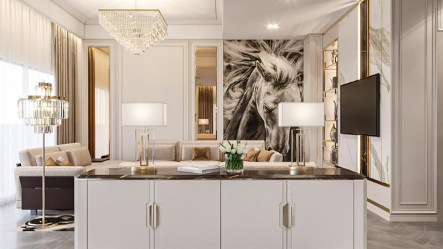 An interior of a room featuring an ornate ceiling with intricate designs, patterned flooring, multiple chandeliers, and stately furniture in white and gold.