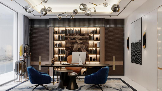 Sculptural staircase with an elegantly curved balustrade and ornamental detailing, showcasing a luxurious and opulent design.