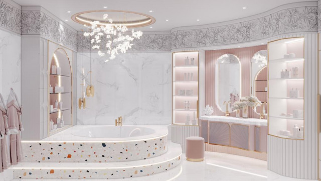 This picture appears to be a photograph of a modern interior design project. The space features several different seating arrangements, along with a substantial bar area to the right with marble countertops and decorative wall tile. There is a white sofa facing three green armchairs around a glass coffee table in the center of the room. The decor includes dark wood furniture, statement lighting, and a unique art piece on the wall.