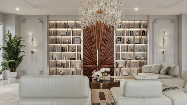 A contemporary livingroom with beige walls and furniture, featuring a large aquarium and accent lighting.