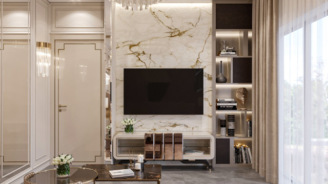 A large open plan kitchen, with white marble floors and walls, modern appliances, and a breakfast bar.