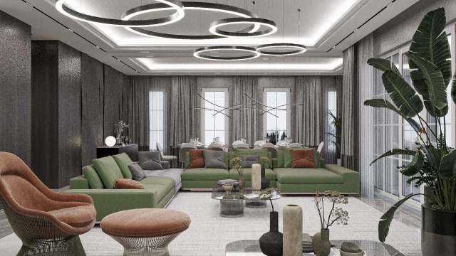 Living room featuring beige sofa, armchair and ottoman with abstract art on the wall.