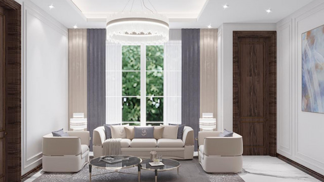 An ornate marble spiral staircase with golden handrails and detailing.