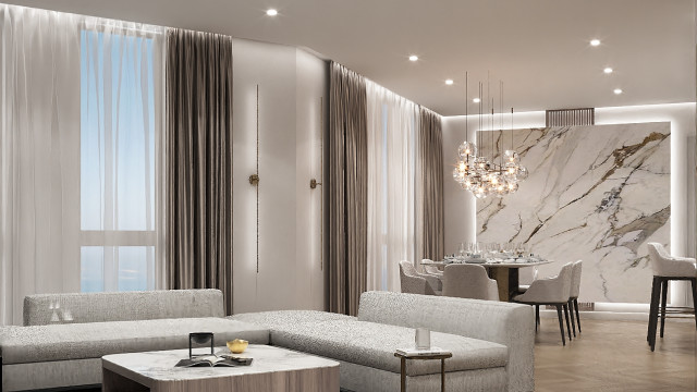 A wooden floor, with two chaise lounge chairs and two side tables arranged in the center, against a backdrop of a feature wall with white vertical and horizontal stripes.