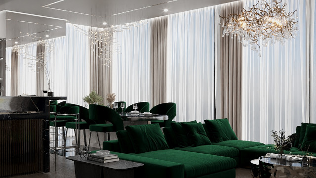 A bright and airy living space featuring a comfortable sitting area, surrounded by pale walls and natural light from large windows.