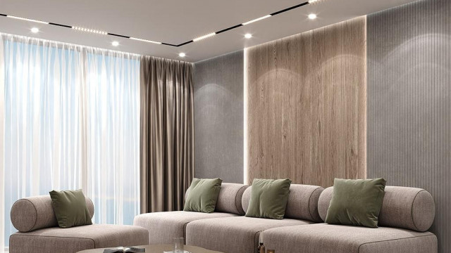 This image shows an ornate and luxurious living room. It has a white marble floor, intricate wood paneling, and beautifully upholstered furnishings. An extravagant crystal chandelier hangs from the ceiling.