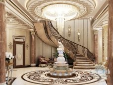 This picture shows a white, three-dimensional cube with a single green stripe running diagonally across its surface. The stripe appears to be emanating from one of the corners of the cube, giving it an interesting and eye-catching effect. The background behind the cube is blurred, making the cube stand out even more.