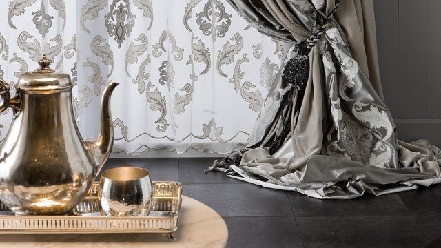 ارتقِ بديكورك مع تصاميم الستائر العصرية