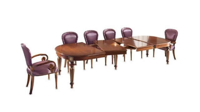 Luxury walnut oval table with gold details